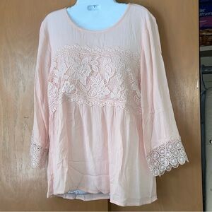 This peach colored feminine lacy top from Three Pink Hearts Trinni is perfect.